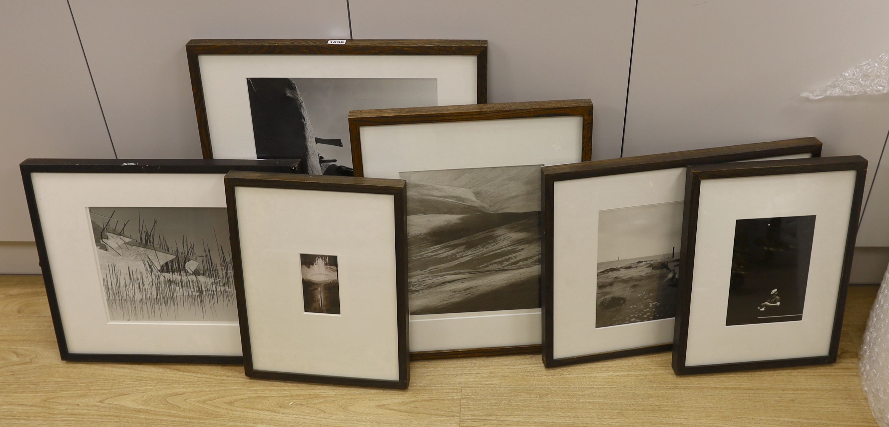 Six assorted contemporary black and white photographs including: Un-named landscape, 33 x 26cm; Abstract, 25 x 31cm, David Hiscock, 'Gymnasium Equipment', 12 x 7cm and Eamon McCabe, 'Li Chen Shie', 23 x 15cm